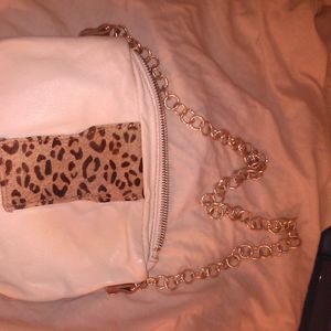 white leather with small cheeter print purse